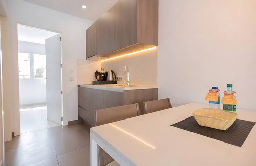 Cala Agulla Apartment | Apartment 'Standard 6' with Shared Pool, Wi-Fi and Air Conditioning
