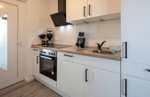 Schillig Apartment | Apartment Steuerbord in Schillg, walking distance to the beach, WLAN, parking, Sky