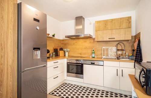 Meckenbeuren Apartment | Apartment 'Tulips' with Shared Garden, Balcony and Wi-Fi