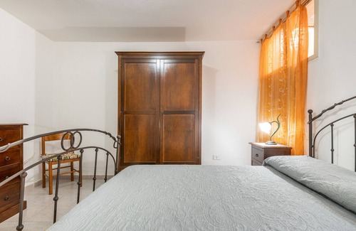 Quartu Sant'Elena Apartment | Apartment "Villa Gianna - Toscano" with Private Terraces, Shared Garden & Wi-Fi