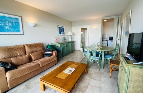 Les Sables d'Olonne Apartment | Apartment with direct beach access, balcony, and private garage