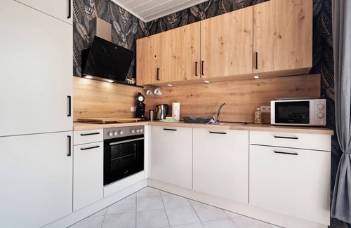 Grosefehn Apartment | Apartment 'Wilma Spetzerfehn' with Private Terrace, Private Garden
