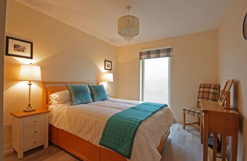 Nairn Apartment | Apartment with balcony overlooking golf course, Moray Firth, mountains and hills
