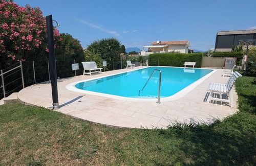 Cisano Apartment | Apartment with garden, terrace, communal pool, 500m to the lake