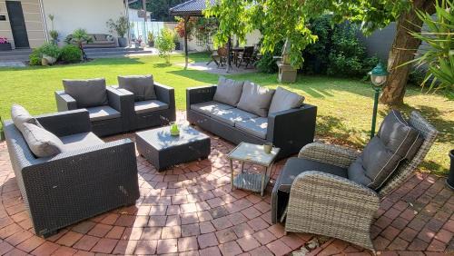 Volkstedt Apartment | Apartments am Saalebogen mit Gartenterrasse, Grillkamin und freie Parkplätze