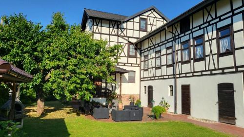 Volkstedt Apartment | Apartments am Saalebogen mit Gartenterrasse, Grillkamin und freie Parkplätze