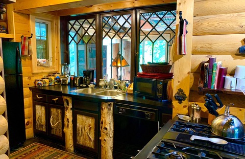 Whittier Cabin | Appalachian Log Cabin on Tuckasegee River. Pet friendly, Hot Tub, Wifi, & HBO