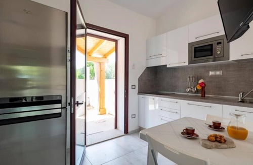 Torre di Bari Apartment | Appartamenti Su Nenneri Appartamento - Piano Terra