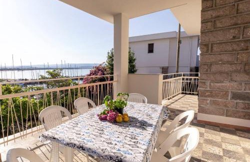 Fertilia House | Appartamento 150 mq in villa sul mare a Fertilia