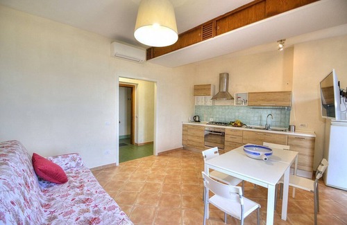 Marina di Puolo House | Appartamento Naia B: A graceful apartment located right on the beach, with Free WI-FI.