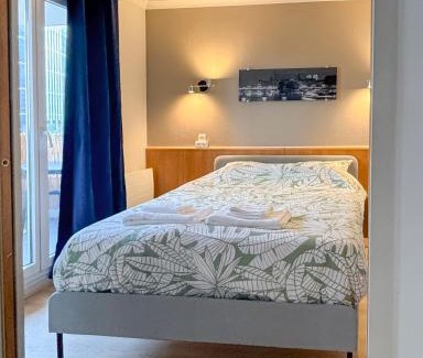 Faubourg de l'Arche Apartment | Appartement 2P Balcon proche La Defense Arena Parking Gratuit