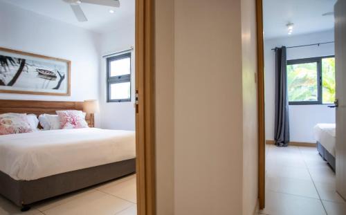 Grande Riviere Noire Apartment | Appartement 3 chambres pied dans l'eau avec plage et grande piscine