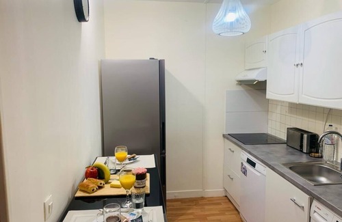 Faubourg de l'Arche Apartment | Appartement Calme et Chaleureux Proche de Paris