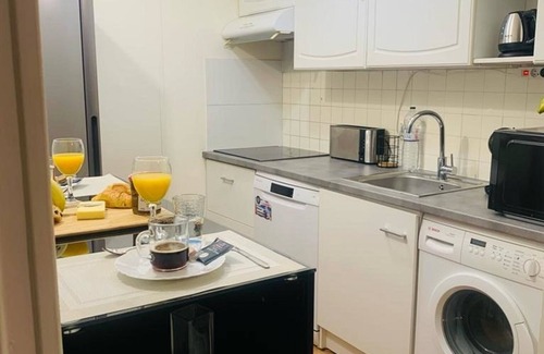 Faubourg de l'Arche Apartment | Appartement Calme et Chaleureux Proche de Paris