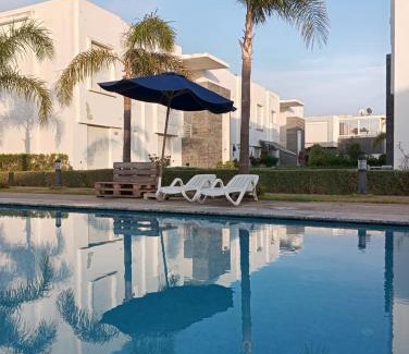 Lamharza Essahel Apartment | Appartement Familial avec Jardin, Résidence avec Piscine Dar El Bahr