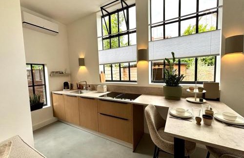 Heerlen Apartment | Appartement het Klaslokaal in de Oude School met tuin