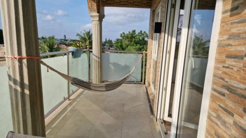 Lome Apartment | Appartement red, classique et harmonieuse
