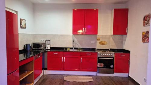 Lome Apartment | Appartement red, classique et harmonieuse