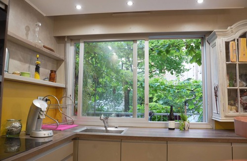 Batignolles Apartment | Appt + Terrasse sur Jardin 4 Personnes Face Métro et Parc Luther King