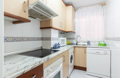 Castell de Ferro Apartment | Apto Castell Beach. Apartment with a spacious seaside terrace.