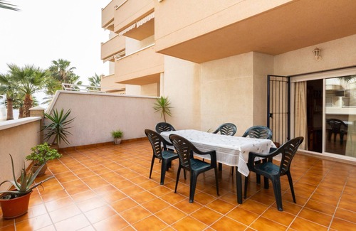 Castell de Ferro Apartment | Apto Castell Beach. Apartment with a spacious seaside terrace.