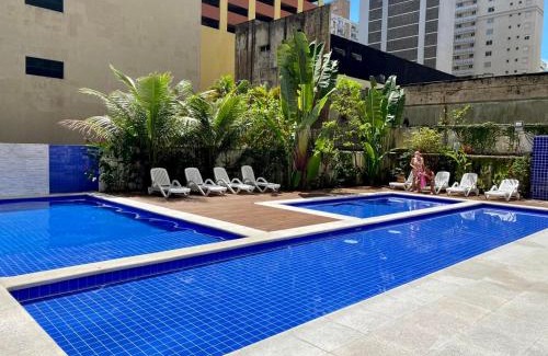 Pitangueiras Apartment | Apto com piscinas, sacada Gourmet, 2 gar, 50 mts da praia