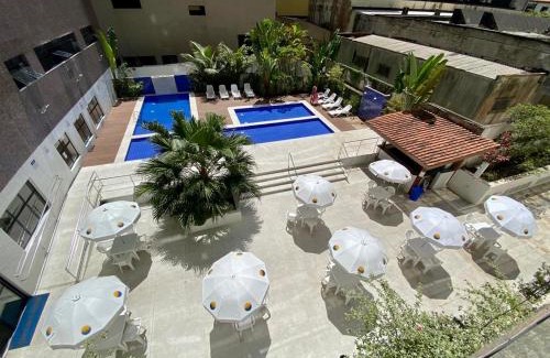 Pitangueiras Apartment | Apto com piscinas, sacada Gourmet, 2 gar, 50 mts da praia