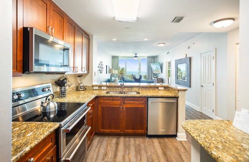 Panama City Beach Condo | Aqua Resort 2nd Floor Rare 4BR/2BTH Beachfront Free Beach Service