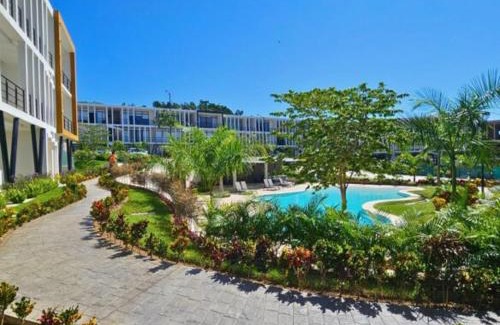 Mezcales Apartment | Araquuna, Chic New Condo, Pool & Balcony By Valléra Homes