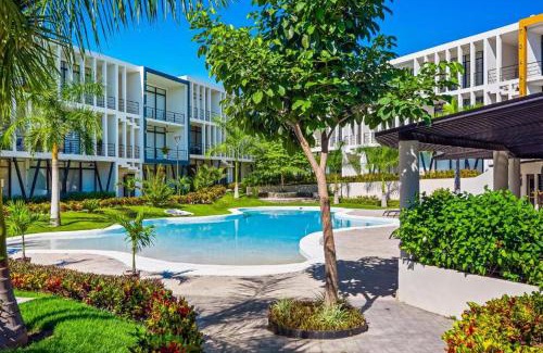 Mezcales Apartment | Araquuna, Chic New Condo, Pool & Balcony By Valléra Homes