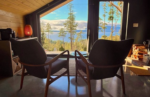 Halfmoon Bay Cabin | Arbutus Ridge, a cozy, architecturally unique cabin surrounded by arbutus trees