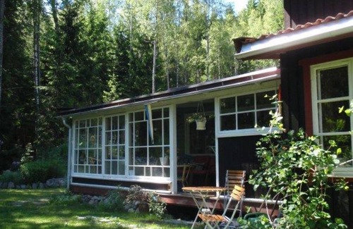 Dals Langed House | Architecturally remarkable holiday home at a forest lake!