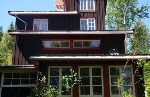 Dals Langed House | Architecturally remarkable holiday home at a forest lake!