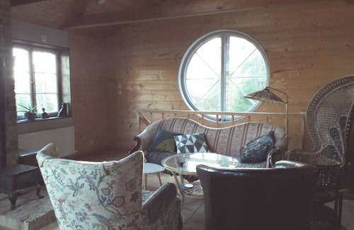 Dals Langed House | Architecturally remarkable holiday home at a forest lake!