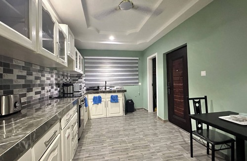 Accra House | Arek Condos- Your Charming Tropical Home Away from Home in the Heart of Accra.