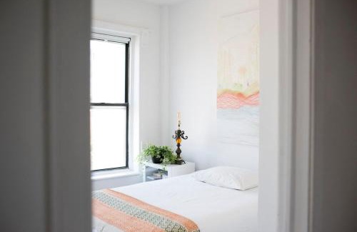 Bedford-Stuyvesant Apartment | Art Filled Brooklyn Brownstone -3 br, 2.5 bath, deck, tv room, library