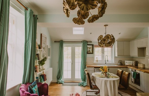 Stranraer Cottage | Artful Retreat: Artemisia Lodge with Vast Garden on Seaside Estate