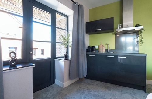 Centrum Apartment | Artist-inspired suite for 2 with king bed, private kitchen, air conditioning, and modern comforts. Perfect for couples, solo travelers, or business stays.