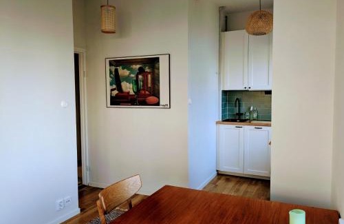 Alppiharju Apartment | Artistic 2-Bedroom full of light