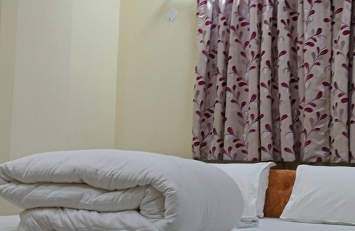 Sector II Hotel | Asha Inn
