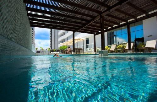 Caminho das Arvores Hotel | Astron Suítes Mondial Salvador by Nobile