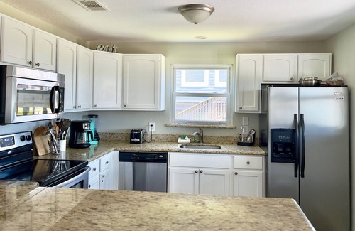 Jamaica Beach House | At Coastal Casa enjoy the waves, the breeze, and a quick walk to the sand.