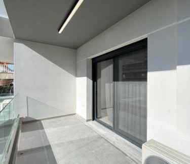 Palaio Faliro Apartment | Athenean Modern Escape near Marina Floisvos