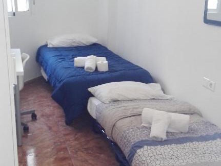 La Petxina House | Attic Rooms in Botánico