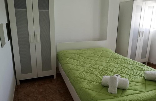 La Petxina House | Attic Rooms in Botánico