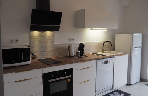 Millau Apartment | Attractive T3 refurbished in an old stone house.
