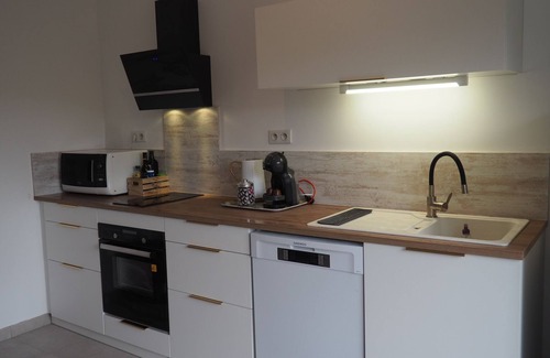Millau Apartment | Attractive T3 refurbished in an old stone house.