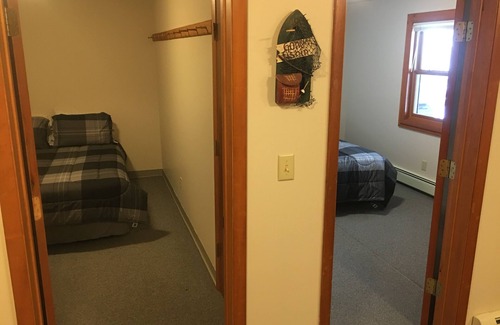 Deerton Cabin | Atv-Snowmobile Trail, sits on the Laughing Whitefish River, sleeps 16 people.