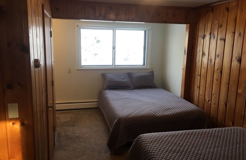 Deerton Cabin | Atv-Snowmobile Trail, sits on the Laughing Whitefish River, sleeps 16 people.