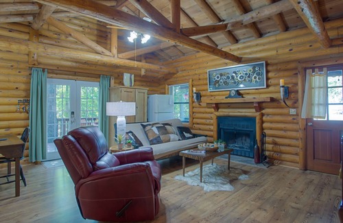 Enchanted Oaks Cabin | Authentic log cabin on Cedar Creek Lake - spectacular views from all 3 decks